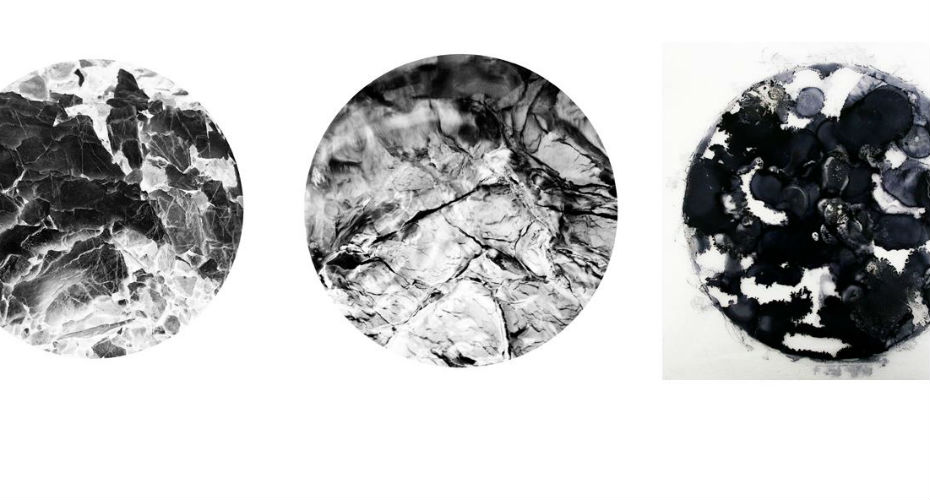 Three circular black and white abstract art pieces. The left shows jagged, cracked ice-like patterns. The middle has smooth, marbled textures with flowing lines. The right features fluid, ink-like designs with dark splotches and lighter areas, creating a dynamic composition. Credit: Oliver Raymond-Barker.