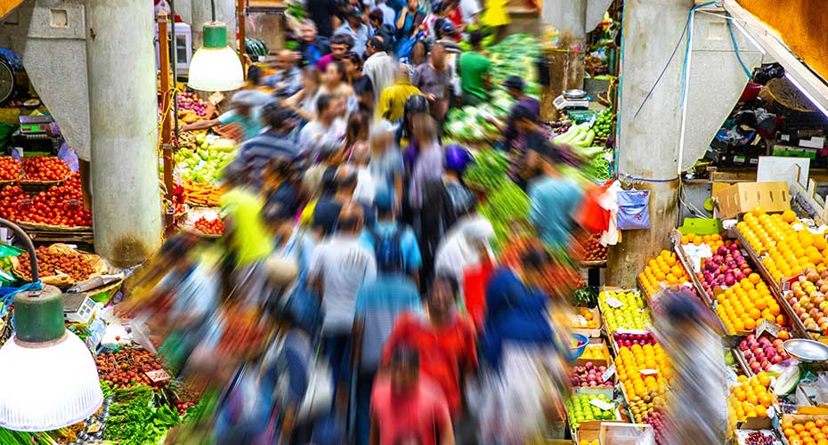 Busy food market blurred