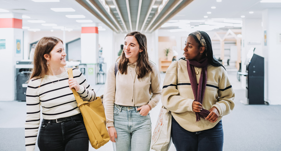 3 female students walking