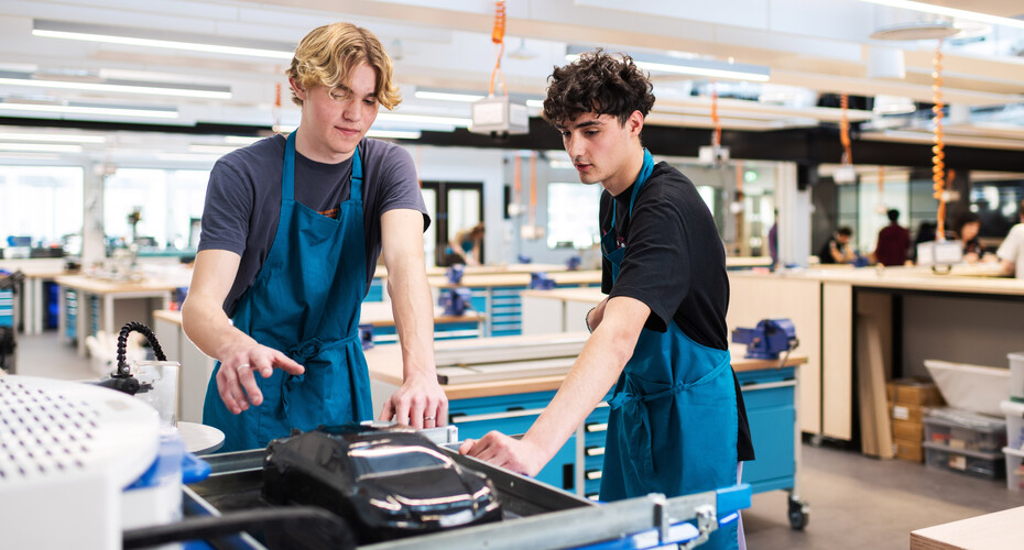 Two engineering students in Harrison Lab