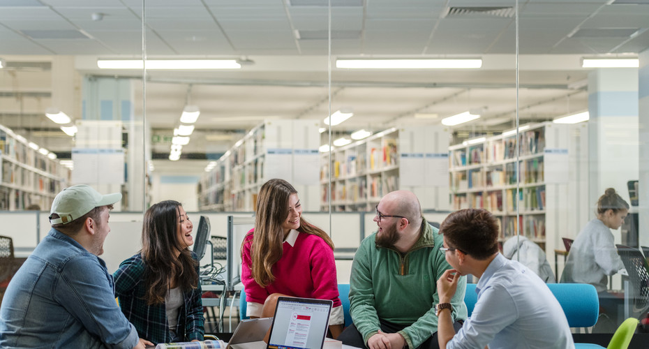 Group of students talking to each other